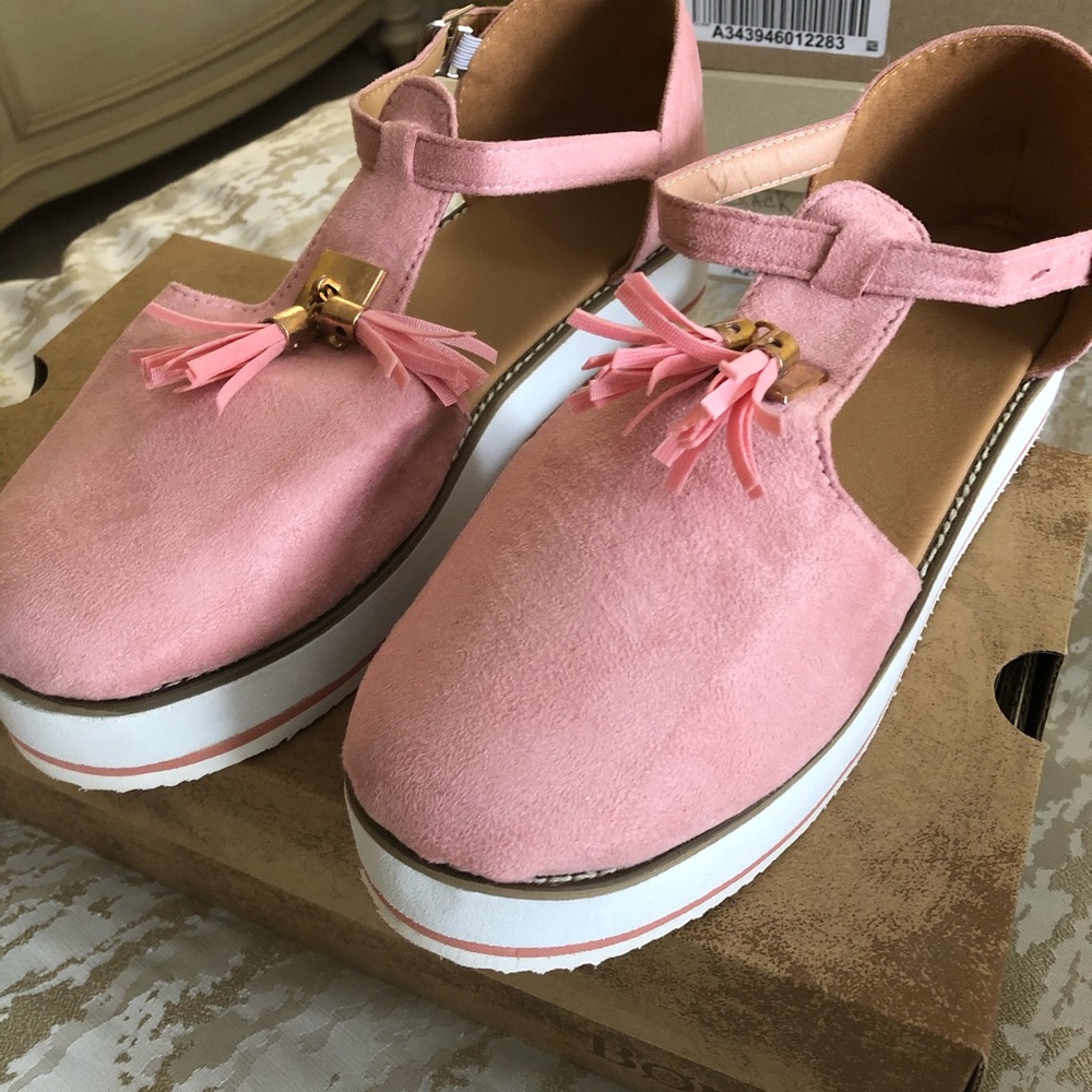 Brand new faux suede open shoes. Never worn.